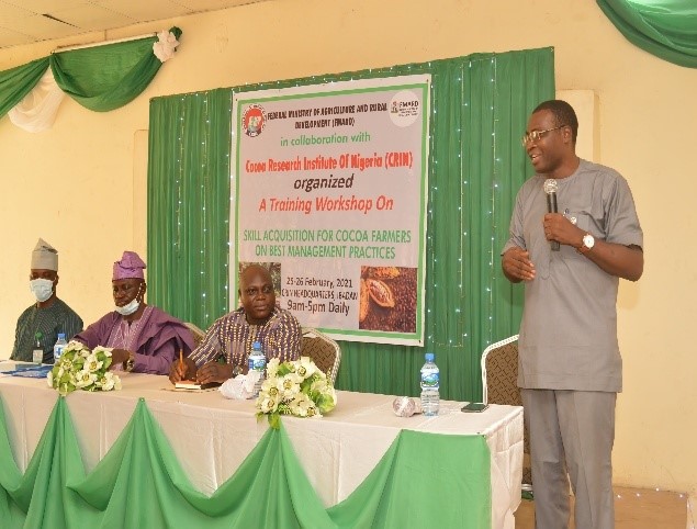 Mr Tobaba Ajayi, Cocoa Desk Officer, Federal Ministry of Agriculture , Zonal coordinator South west, Dr Patrick Adebola, Executive Director, CRIN and Dr S.O. Agbeniyi Director Training